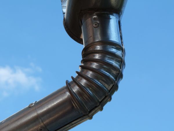 Metal Downspout Installation in Longview